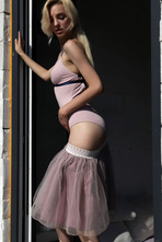 brown-eyed Ukrainian stunner slips out of her tutu style skirt 01