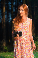 Hot redhead Michelle H wanders through lush countryside with her camera 02