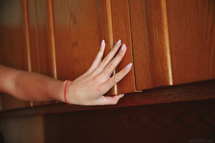 Leggy honey Mya sits on her bed 00