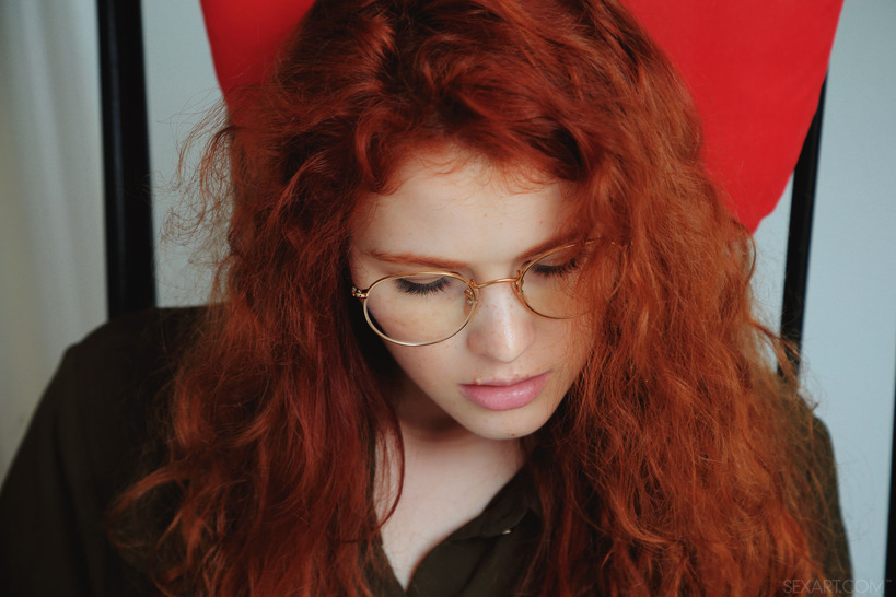 Studious redhead Adel C looks sexy in her gold rimmed glasses 00
