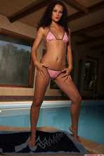 Sexy Brunette Babe Gets Nude By The Pool 00